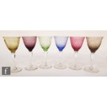 A harlequin set of 20th Century Venetian wine glasses each engraved in the Watteau style with