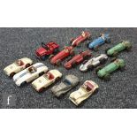 A collection of thirteen playworn Dinky Toys diecast model cars, to include seven racing cars (