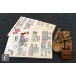 A stock album of British stamps, a similar stock book of Belgian issues and small quantity of