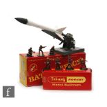 An OO gauge Triang Battle Space R672 Honest John Pad, comprising launch pad and rocket, with a