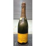 A 1920s bottle of dry Veuve Cliquot Ponsadeu Champagne, retaining most of its label.