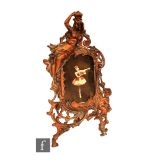 A 19th Century style cast picture frame with a maiden wearing a crown and putti to large foliate