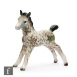 A Beswick foal, model 763 in rocking horse grey.