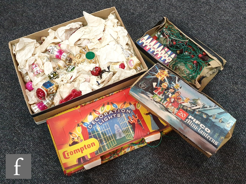 A collection of 1950s Christmas decorations to include a selection of baubles and three sets of