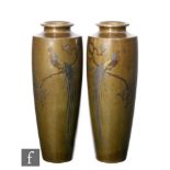 A pair of late 19th Century Japanese Meji period inlaid bronze cylindrical vases of tapering form