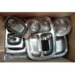 A collection of assorted silver plate and stainless steel serving dishes of varying form to