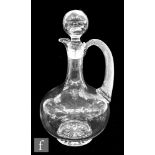 An early 20th Century Richardson's clear crystal claret jug of globe and shaft form with applied air