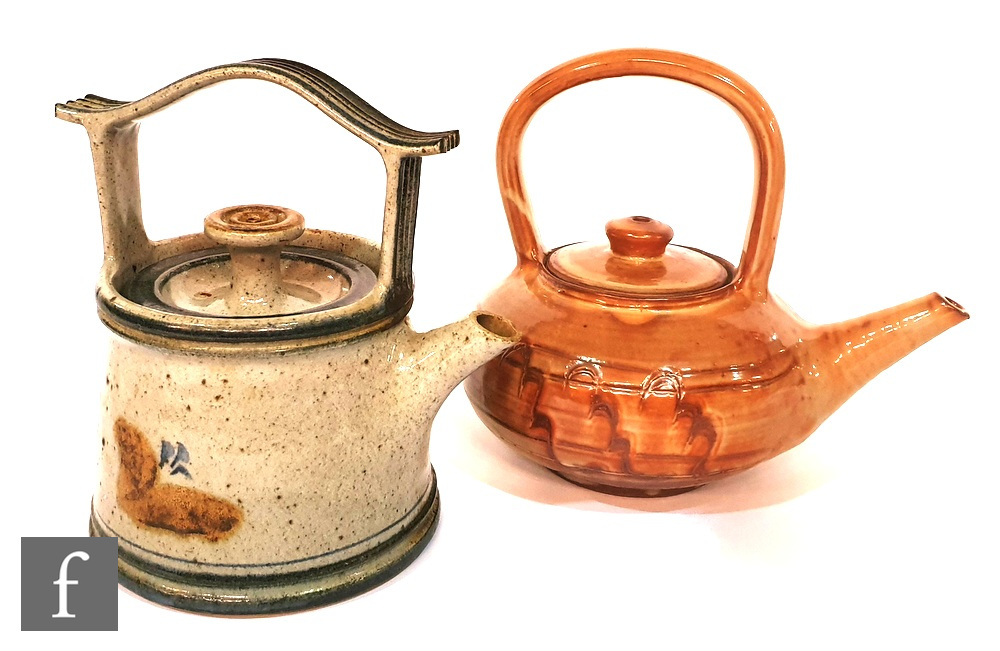 A Wenford Bridge studio pottery tea kettle decorated with a tonal peach glaze with incised