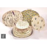 A collection of assorted Midwinter Stylecraft plates and bowls, patterns to include Carribean,