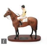 A Beswick Connoisseur model of Arkle with Pat Taaffe up, printed and painted marks, height 33cm.