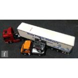 A Tamiya 1:14 scale radio control model composed of a 56318 Scania R470 Highline tractor unit in red