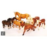 A collection of assorted Beswick animals to include a Hereford calf, a Friesian calf, a fox, various