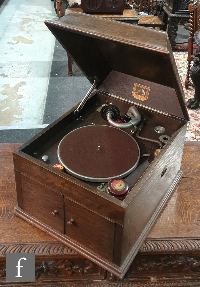 An HMV model 109 oak cased table top gramophone and a large quantity of 78rpm records. (qty)