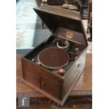 An HMV model 109 oak cased table top gramophone and a large quantity of 78rpm records. (qty)