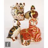 Three boxed Royal Crown Derby paperweights comprising Koala and Baby, Puffin and Red Squirrel