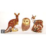 Three Royal Crown Derby paperweights comprising Kangaroo, Owl and Fawn, all with printed marks and