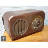 An Ekco AC85 Superhet radio in brown bakelite case, width 52cm.