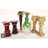 A collection of late 19th and early 20th Century 'End of Day' glass to include hyacinth vases,