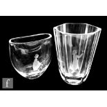Two post war Orrefors clear crystal glass vases designed by Sven Palmqvist, the first of