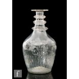 An Act of Union glass decanter circa 1801, of Prussian form, with three applied annulated rings to