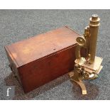 A 19th Century brass compound microscope, the platform base signed S & B Soloman LondonW in fitted