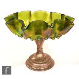 An early 20th Century Kralik bowl with wave rim and deep dimpled decoration to the green