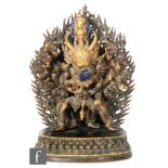 A Sino-Tibetan cast copper alloy figure of Usnisavijaya, the Buddhist divinity representing