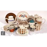 A collection of assorted Midwinter to include coffee pots, storage jars and mugs in patterns to