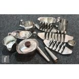 A collection of assorted Robert Welch Old Hall stainless steel to include toast racks, gravy and