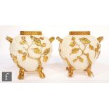 A pair of late 19th Century Royal Worcester Aesthetic vases each of compressed egg form with moulded