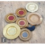A collection of turned oak collection plates and bags including two brass examples, also communion
