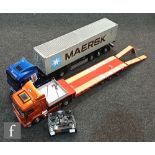 Two 1:14 scale remote control models, the first composed of Tamiya 56323 Scania R620 6x4 Highline