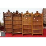 A set of four oak framed Gothic hymn and psalm boards and a box of numbers. (qty)