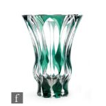 A 20th Century Val St Lambert vase of waisted form, the clear crystal cased in green and flash cut