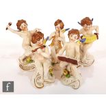 A collection of Capodimonte putti music band figures, to include singer, flautist, drummer,