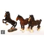 A collection of three Beswick Horses comprising Cantering Shire model 975 in brown gloss, Rearing