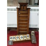 An oak wall mounted hymn stand, 112cm x 40cm and a box of numbers. (qty)