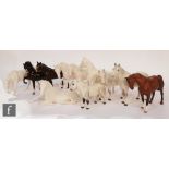 A collection of eleven Royal Doulton horses of varying form and glazes, printed marks, all marked as