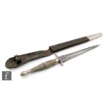 A World War Two Fairbarn Sykes first pattern F-S Fighting Knife, with nickel plated knurled grip and