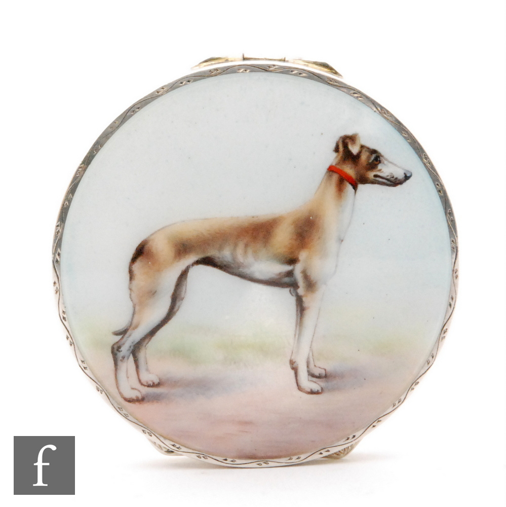 A hallmarked silver circular box with enamelled study of a standing dog to the hinged cover,