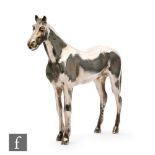 A hallmarked study of a standing horse, height 13cm, weight 22.5oz, London 1969, Wakely & Wheeler.