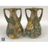 Amphora - A pair of early 20th Century Jugendstil vases each decorated with yellow roses and foliage