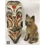 A later 20th Century studio pottery figure of a stylised cat by Barbara Watkins, glazed in mottled