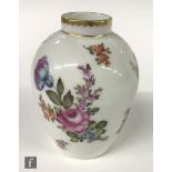 A late 19th to early 20th Century vase of shouldered form decorated with hand painted floral