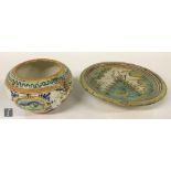 Two pieces of 19th Century Majolica comprising a small shallow dish decorated with a stylised tree