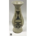 A later 20th Century studio pottery vase by Barbara Watkins, of footed ovoid form with flared