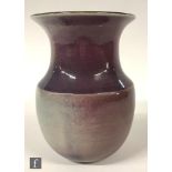 A later 20th Century studio pottery vase by George Wilson of shouldered ovoid form with a flared