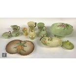 A collection of assorted 1930s and later Carlton Ware embossed wares to include two chocolate