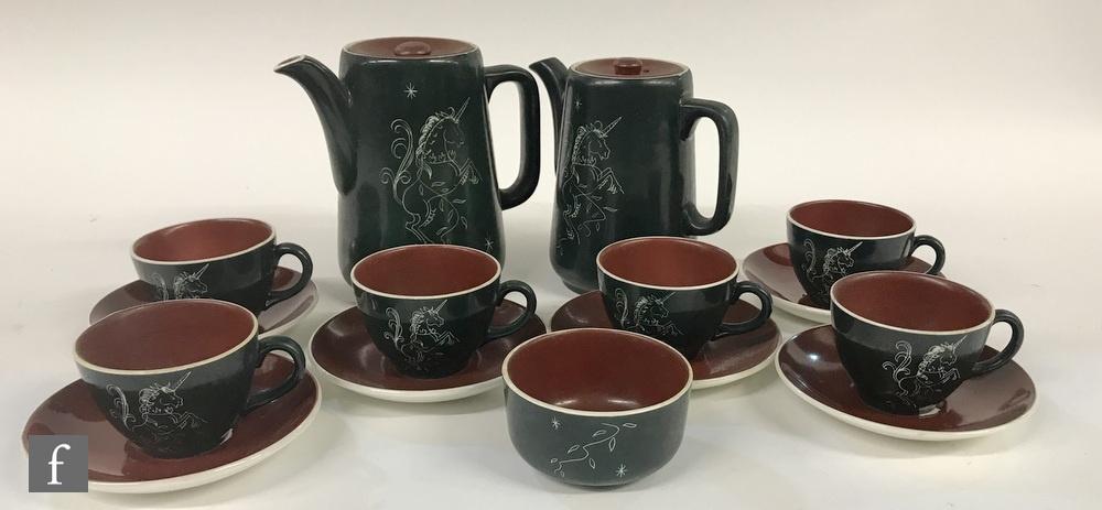 A 1950s tea and coffee service by Tern, green with incised image of a rearing unicorn, comprising