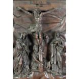 An important 18th Century Renaissance Revival period carved wooden Panel, depicting the crucifixion,